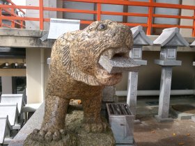 朝護孫子寺　一億円を咥えたトラ